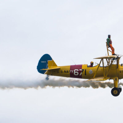 Save the Children Jumping Jumpers Wing Walker on a bi-plane - TOMO Events