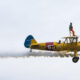 Save the Children Jumping Jumpers Wing Walker on a bi-plane - TOMO Events